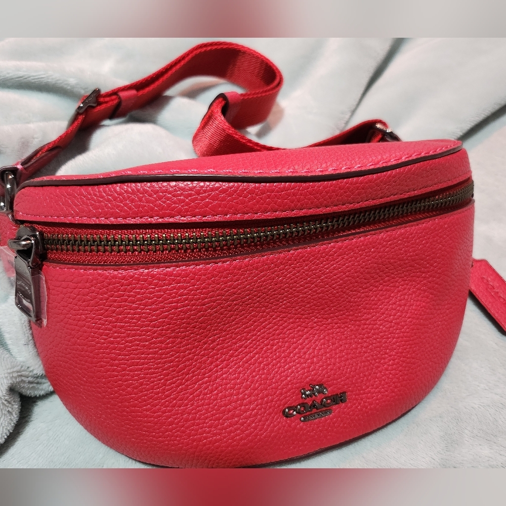 615. Coach cherry red belt bag